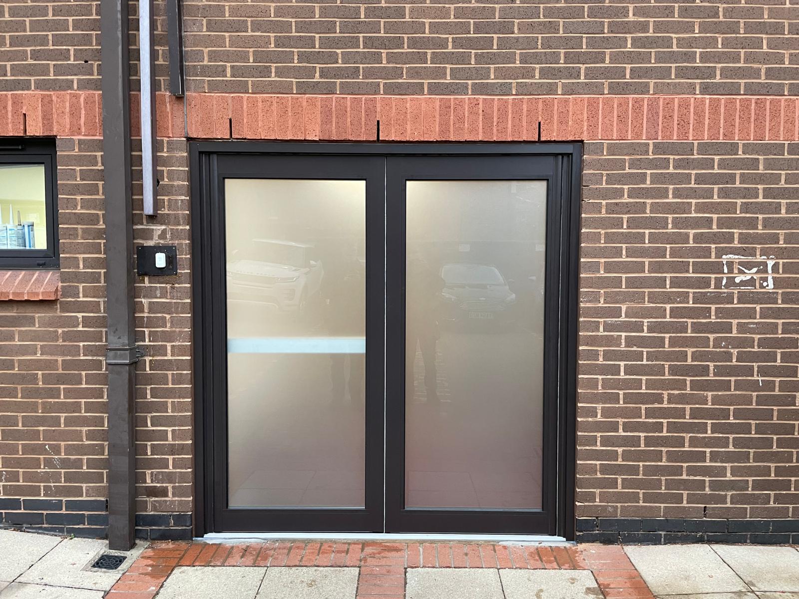 Industrial Doors by Aluglass Solutions