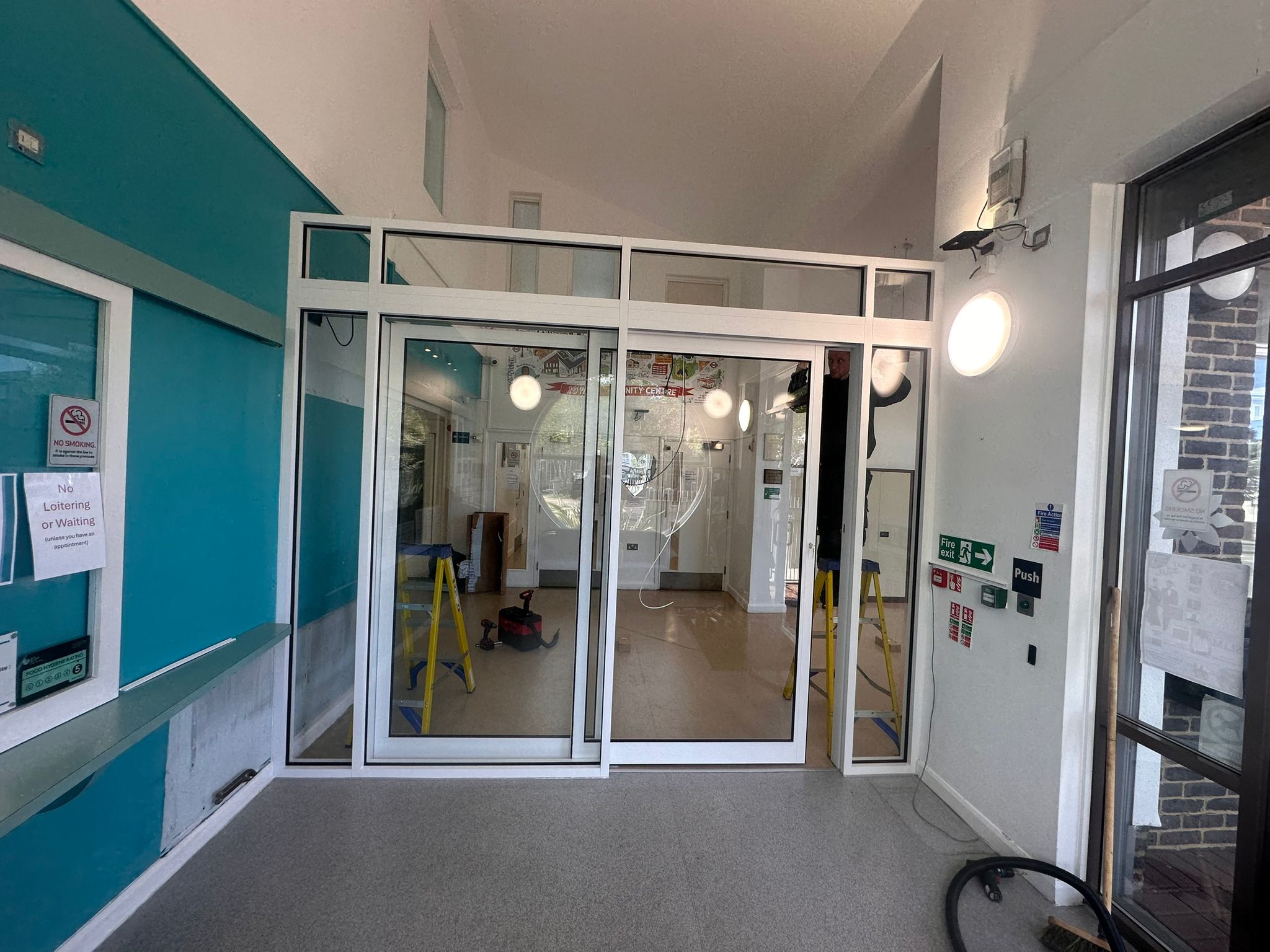 Automatic door replacement at hospital entrance completed by AluGlass Solutions London