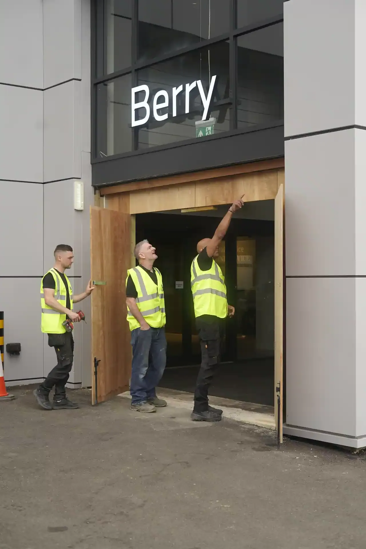 Aluglass engineers removing the existing entrance at BMW Berry Showroom