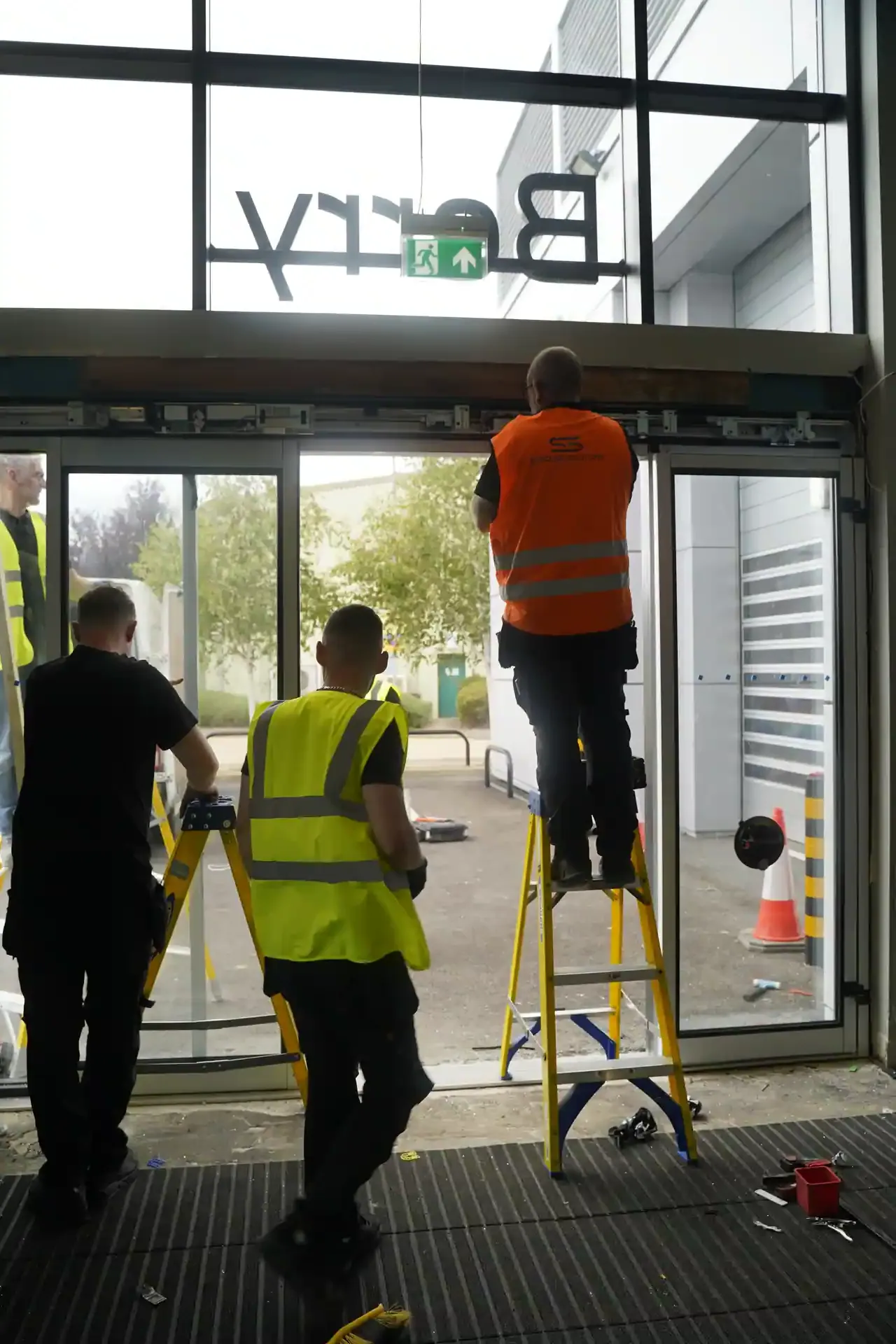 Detail of a glazed door panel fitted during installation